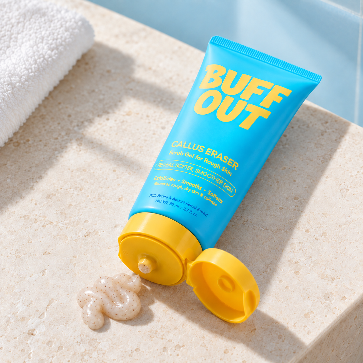 BuffOut Callus Eraser with open yellow cap and cream-colored scrub gel
